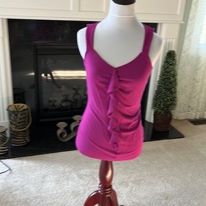 White House Black Market sleeveless top X S. Hip length v neck with ruffled